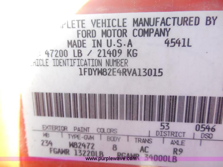 image for item I1378 1994 Ford LNT8000 tilt bed truck