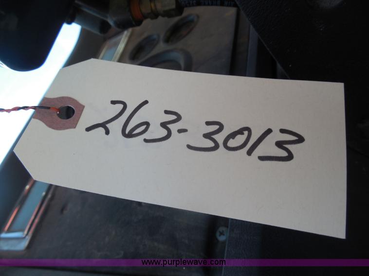 image for item I1378 1994 Ford LNT8000 tilt bed truck