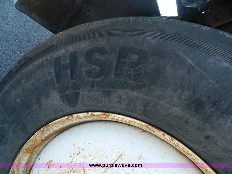 image for item I1378 1994 Ford LNT8000 tilt bed truck