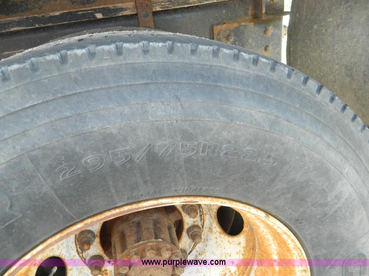 image for item I1378 1994 Ford LNT8000 tilt bed truck