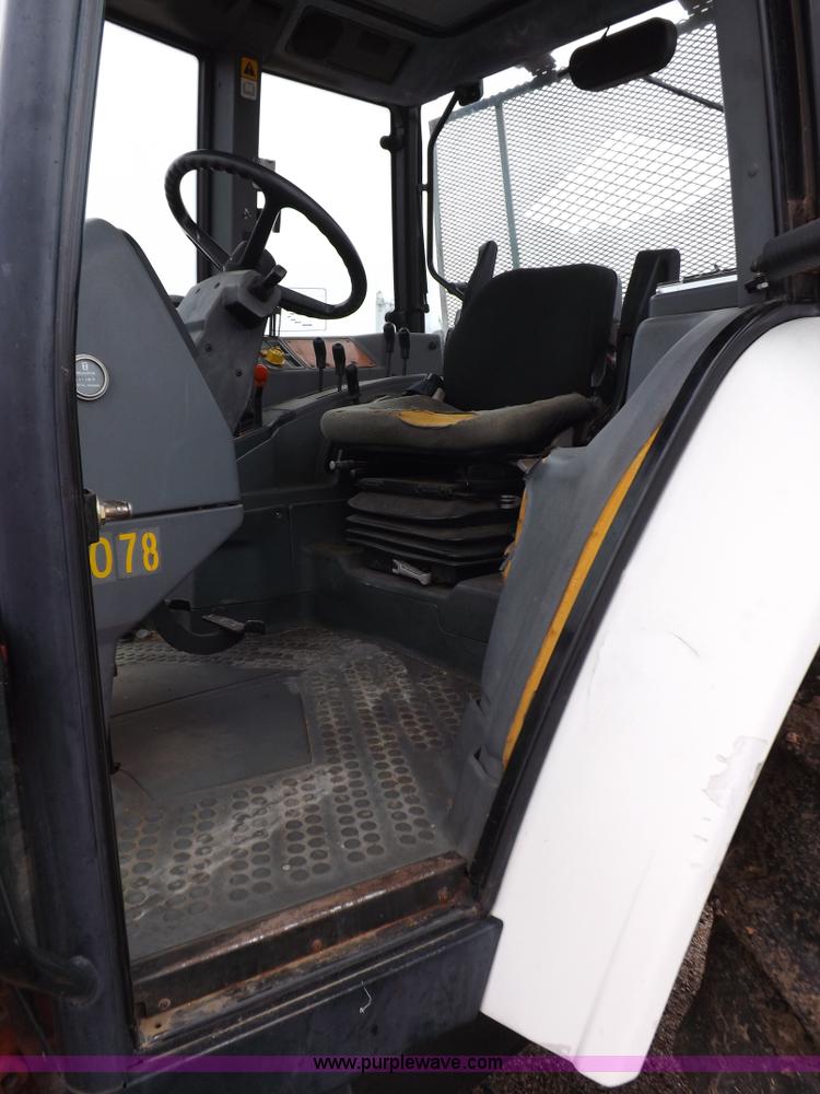 image for item I7526 1997 Ford New Holland 6640SL tractor