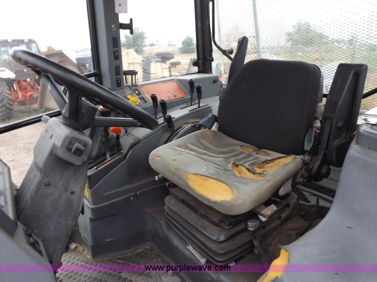 image for item I7526 1997 Ford New Holland 6640SL tractor