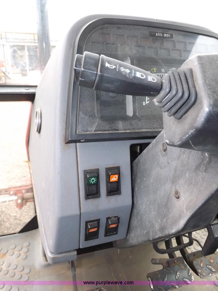 image for item I7526 1997 Ford New Holland 6640SL tractor