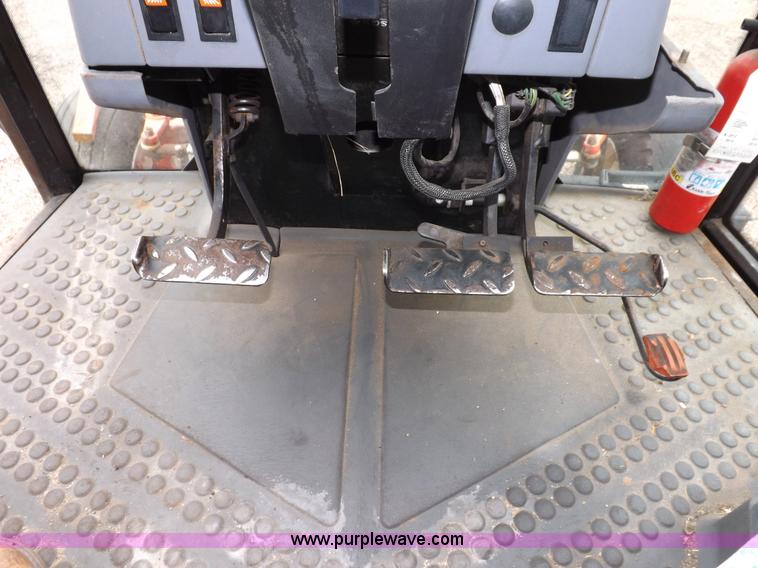 image for item I7526 1997 Ford New Holland 6640SL tractor