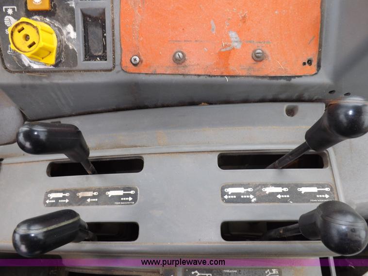 image for item I7526 1997 Ford New Holland 6640SL tractor