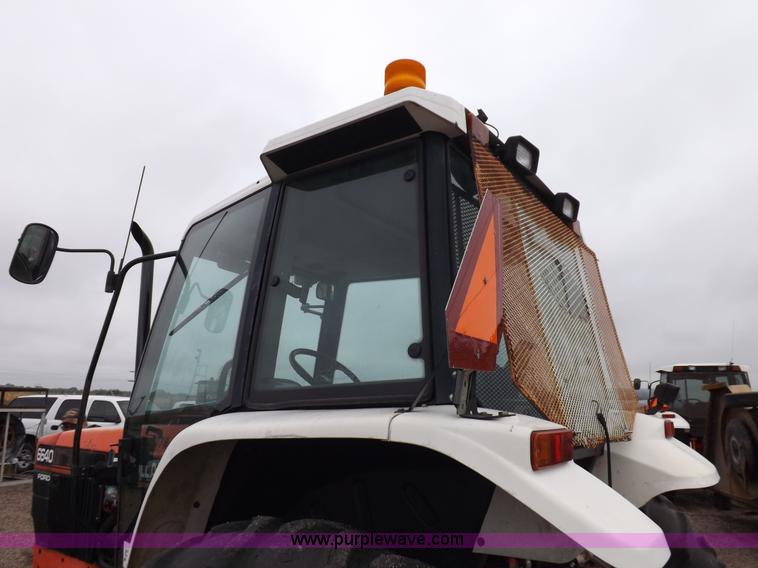 image for item I7526 1997 Ford New Holland 6640SL tractor