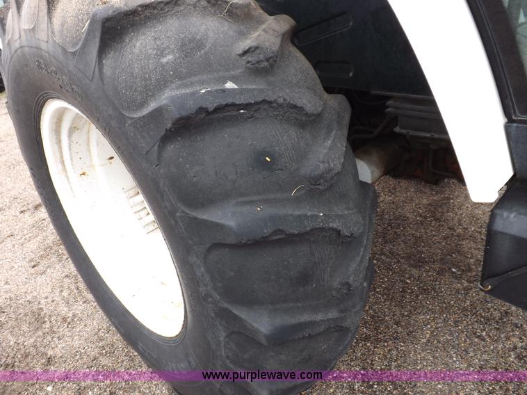 image for item I7526 1997 Ford New Holland 6640SL tractor