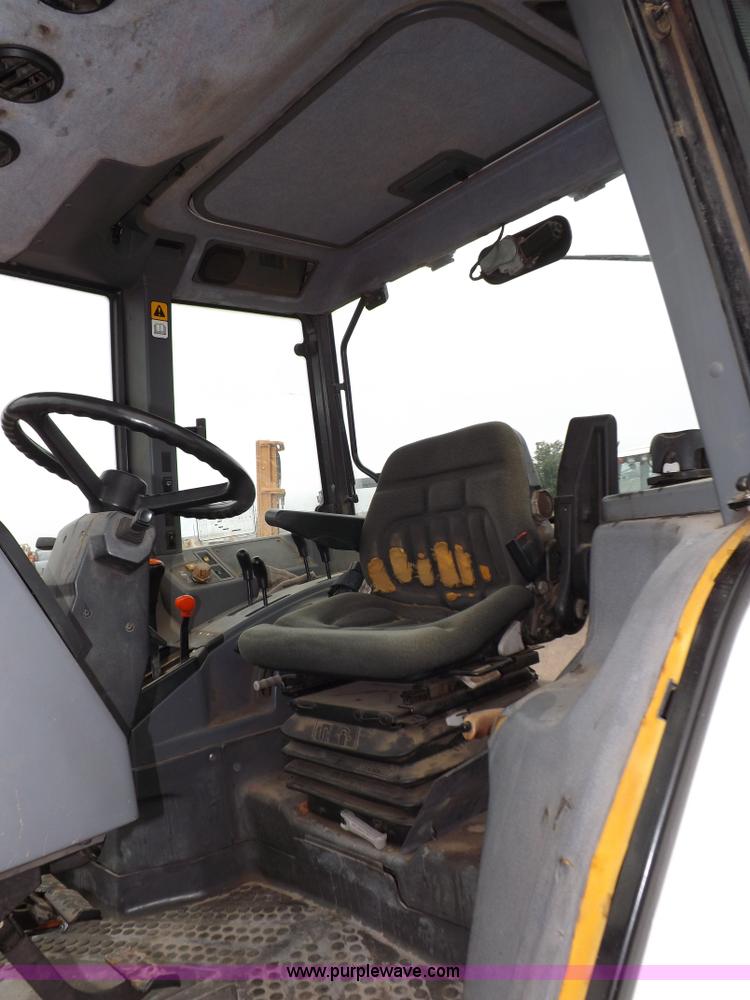 image for item I7527 1998 Ford 7740SL MFWD tractor