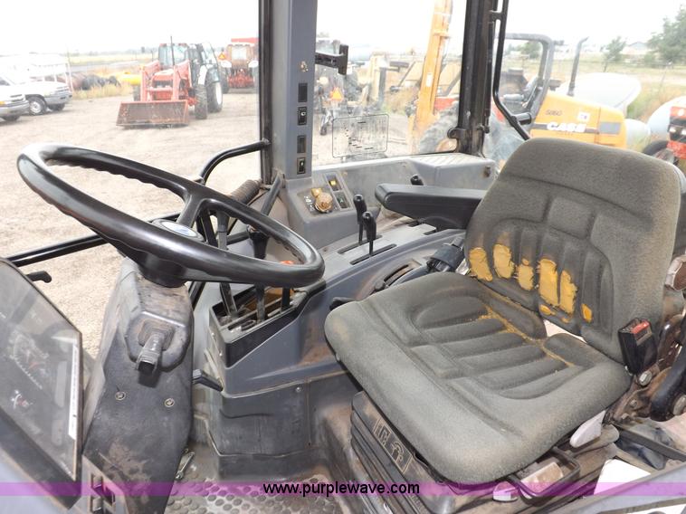 image for item I7527 1998 Ford 7740SL MFWD tractor