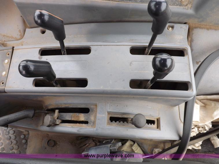 image for item I7527 1998 Ford 7740SL MFWD tractor