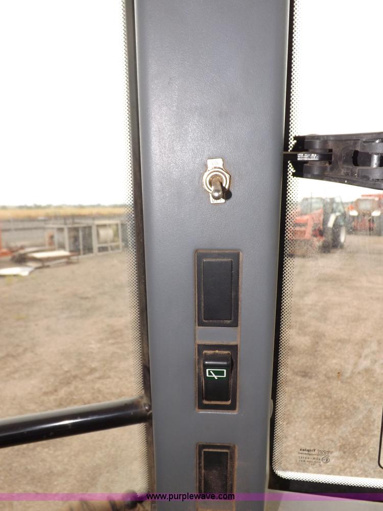 image for item I7527 1998 Ford 7740SL MFWD tractor