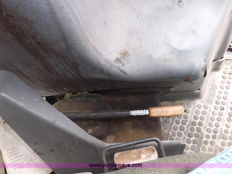 image for item I7527 1998 Ford 7740SL MFWD tractor