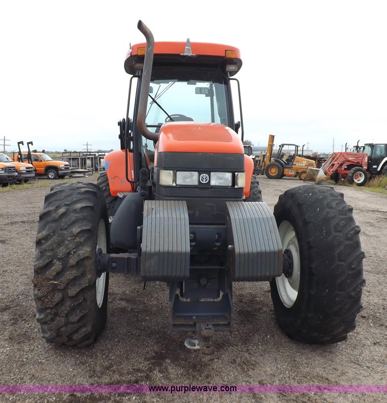 image for item I7528 1999 New Holland TV-140 MFWD bi-directional tractor