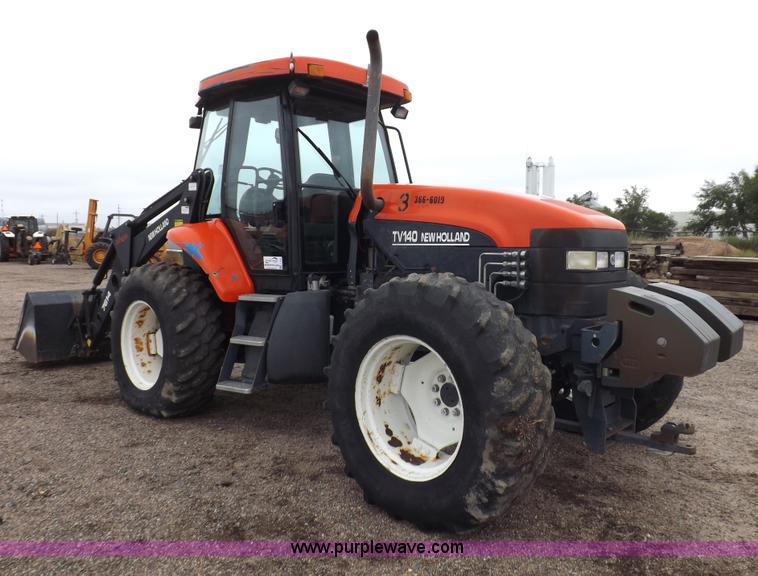 image for item I7528 1999 New Holland TV-140 MFWD bi-directional tractor