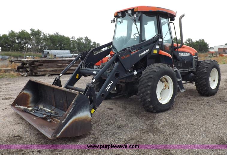 image for item I7528 1999 New Holland TV-140 MFWD bi-directional tractor