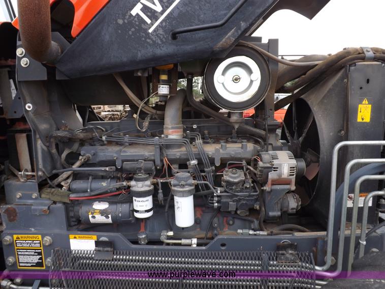 image for item I7528 1999 New Holland TV-140 MFWD bi-directional tractor