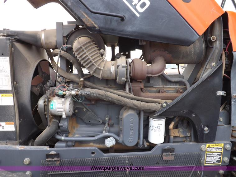 image for item I7528 1999 New Holland TV-140 MFWD bi-directional tractor