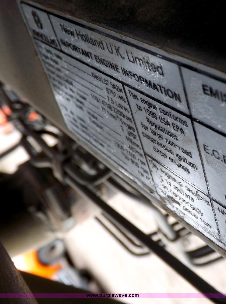 image for item I7528 1999 New Holland TV-140 MFWD bi-directional tractor