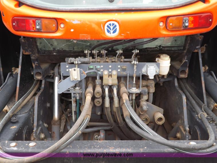 image for item I7528 1999 New Holland TV-140 MFWD bi-directional tractor