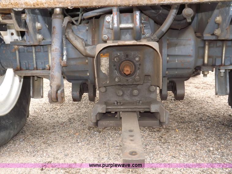 image for item I7528 1999 New Holland TV-140 MFWD bi-directional tractor