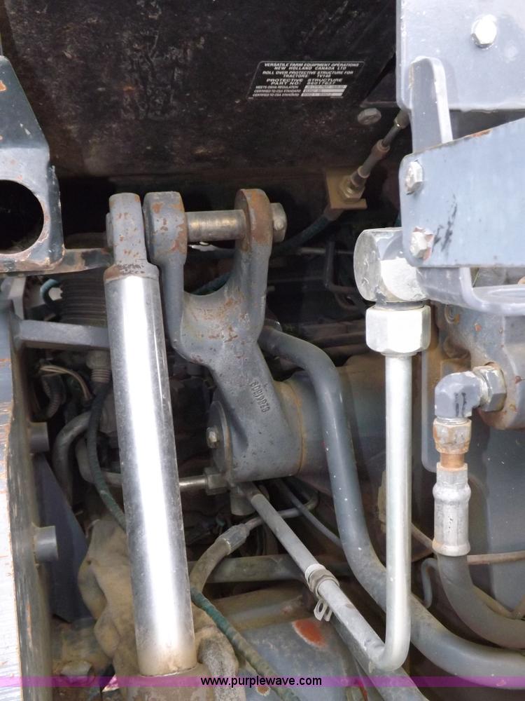 image for item I7528 1999 New Holland TV-140 MFWD bi-directional tractor