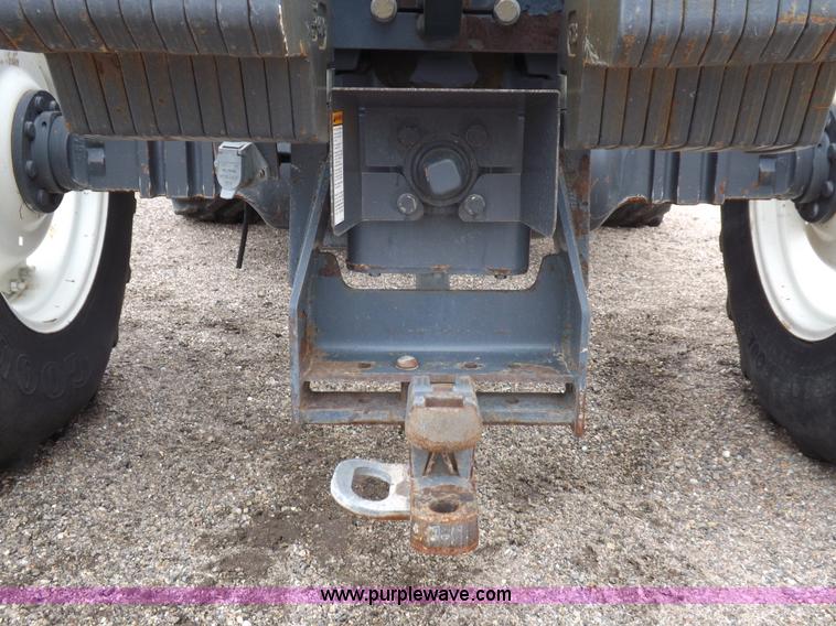 image for item I7528 1999 New Holland TV-140 MFWD bi-directional tractor