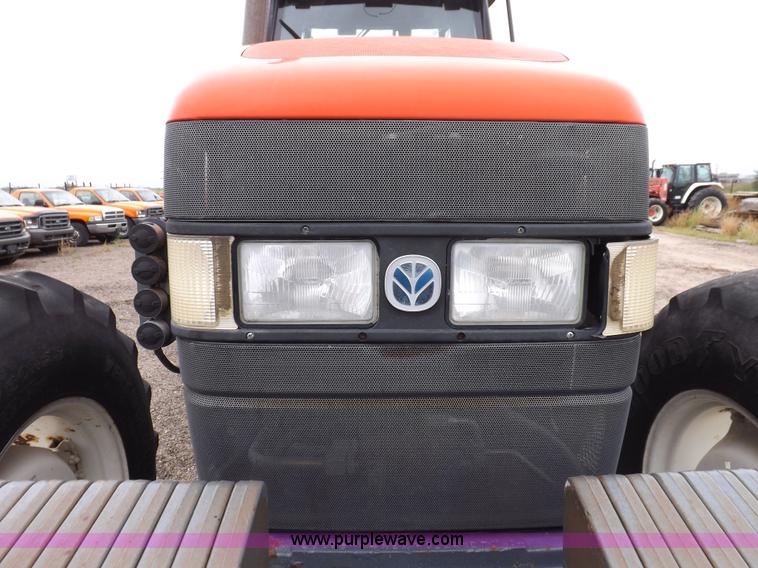 image for item I7528 1999 New Holland TV-140 MFWD bi-directional tractor