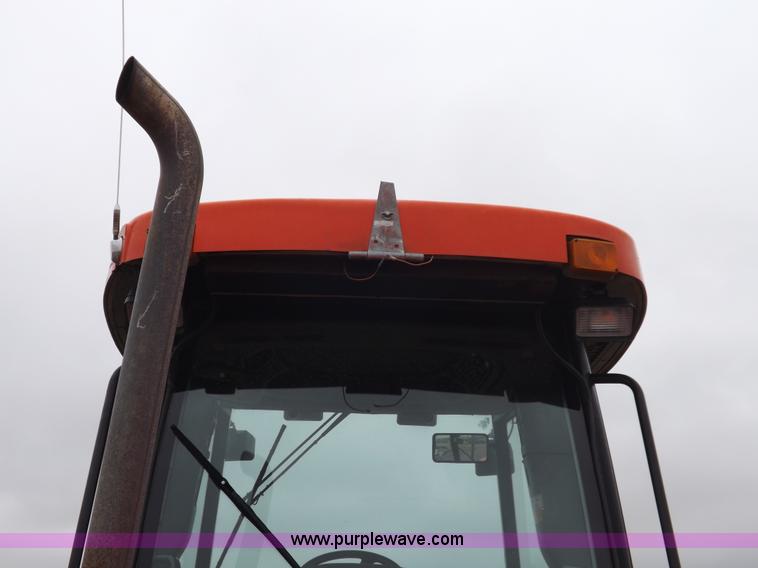 image for item I7528 1999 New Holland TV-140 MFWD bi-directional tractor