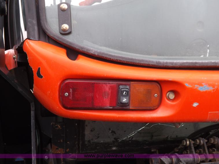 image for item I7528 1999 New Holland TV-140 MFWD bi-directional tractor