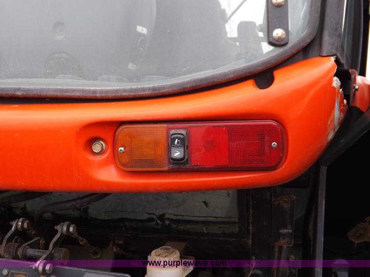 image for item I7528 1999 New Holland TV-140 MFWD bi-directional tractor