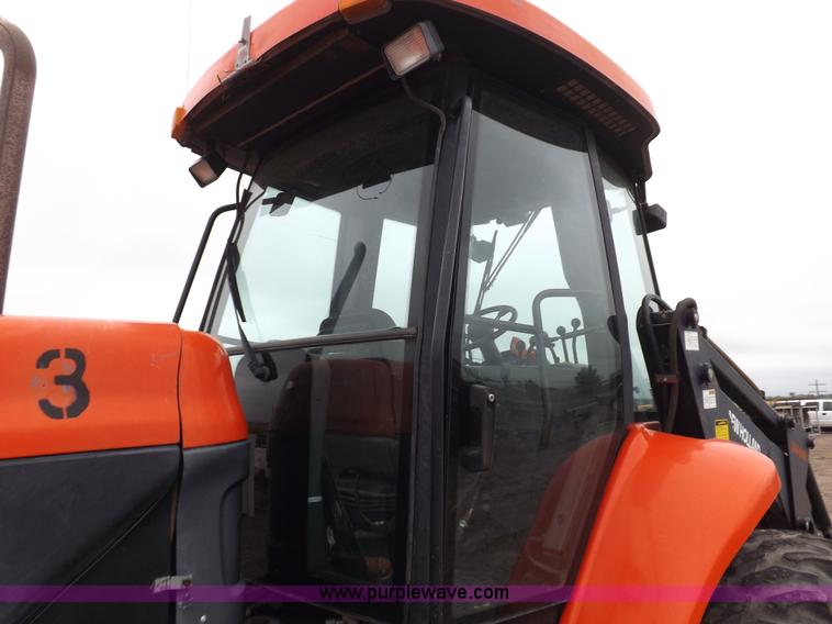 image for item I7528 1999 New Holland TV-140 MFWD bi-directional tractor