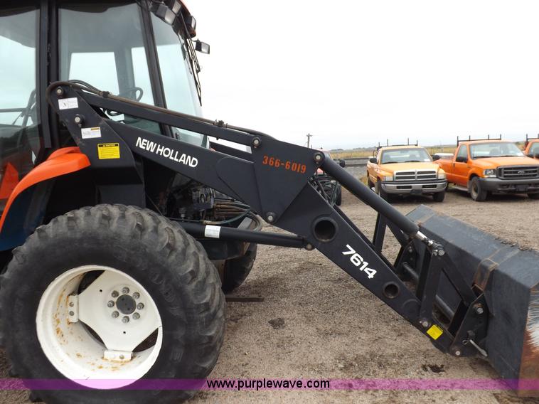 image for item I7528 1999 New Holland TV-140 MFWD bi-directional tractor