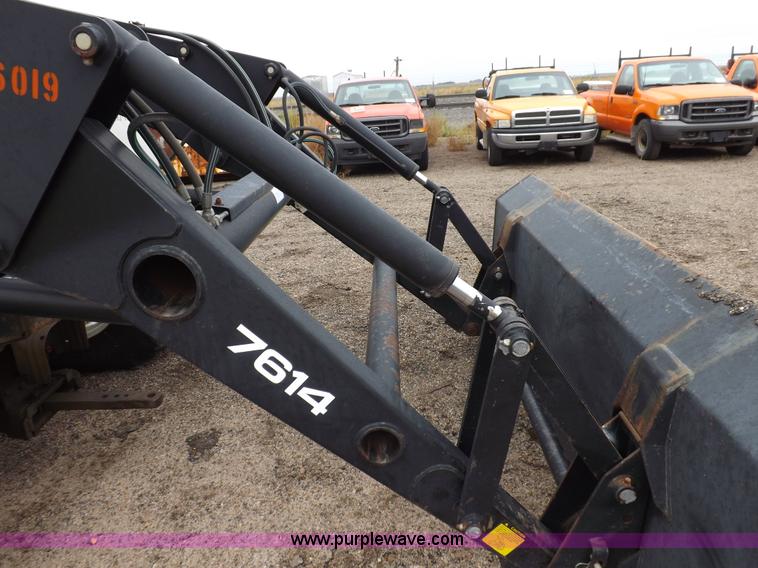 image for item I7528 1999 New Holland TV-140 MFWD bi-directional tractor