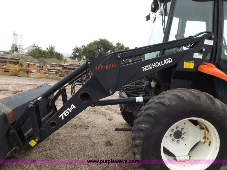 image for item I7528 1999 New Holland TV-140 MFWD bi-directional tractor