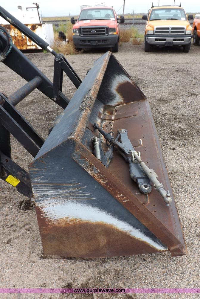 image for item I7528 1999 New Holland TV-140 MFWD bi-directional tractor