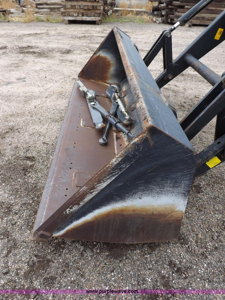 image for item I7528 1999 New Holland TV-140 MFWD bi-directional tractor