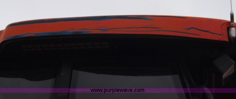 image for item I7528 1999 New Holland TV-140 MFWD bi-directional tractor