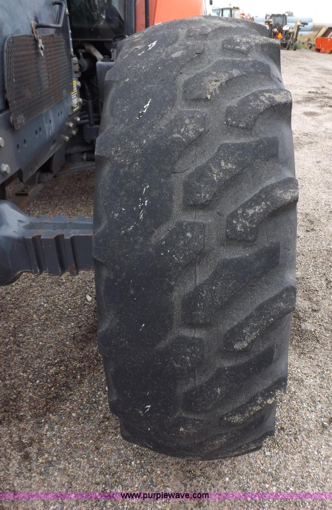 image for item I7528 1999 New Holland TV-140 MFWD bi-directional tractor