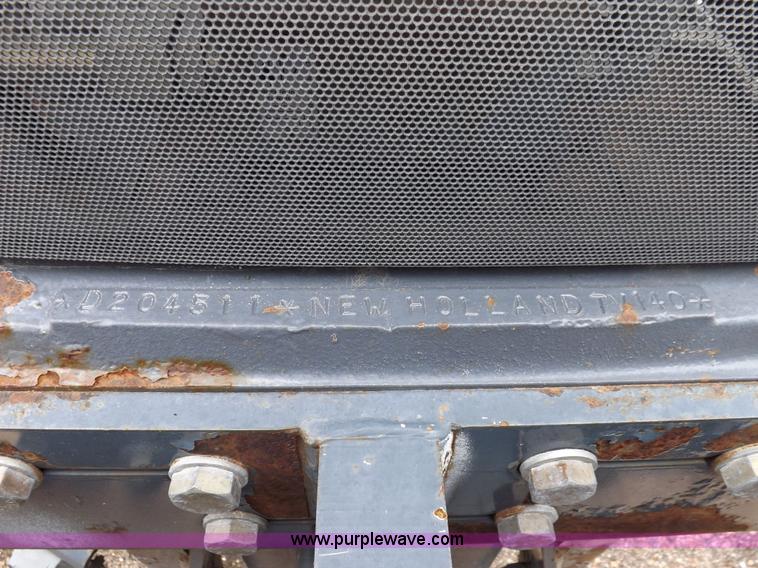 image for item I7528 1999 New Holland TV-140 MFWD bi-directional tractor