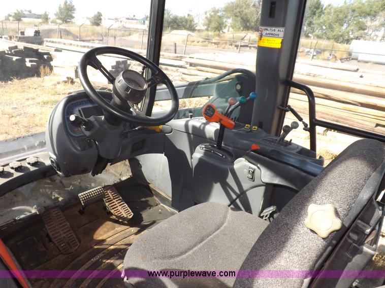 image for item I7528 1999 New Holland TV-140 MFWD bi-directional tractor