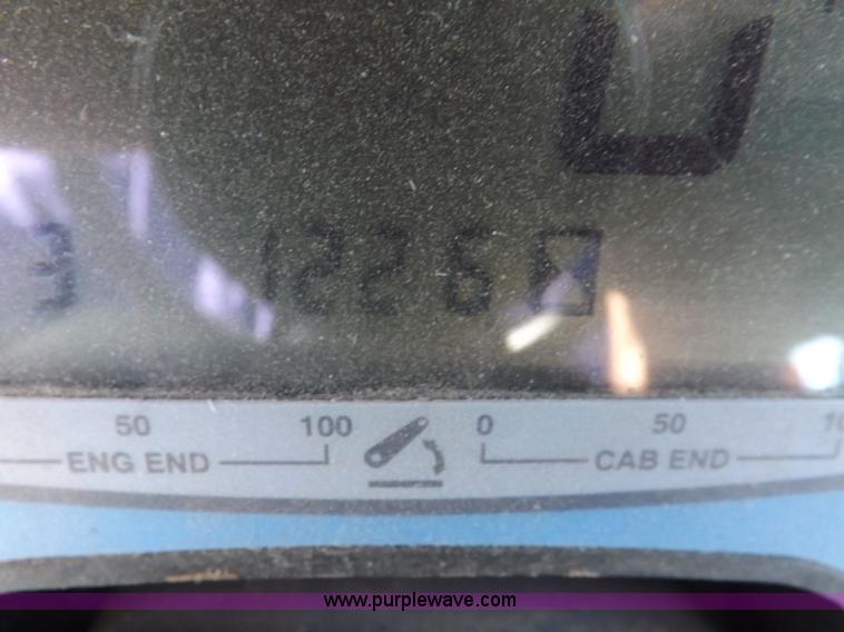 image for item I7528 1999 New Holland TV-140 MFWD bi-directional tractor