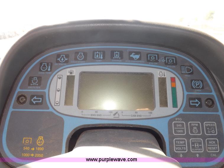 image for item I7528 1999 New Holland TV-140 MFWD bi-directional tractor