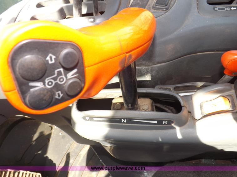 image for item I7528 1999 New Holland TV-140 MFWD bi-directional tractor