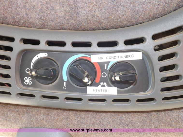 image for item I7528 1999 New Holland TV-140 MFWD bi-directional tractor