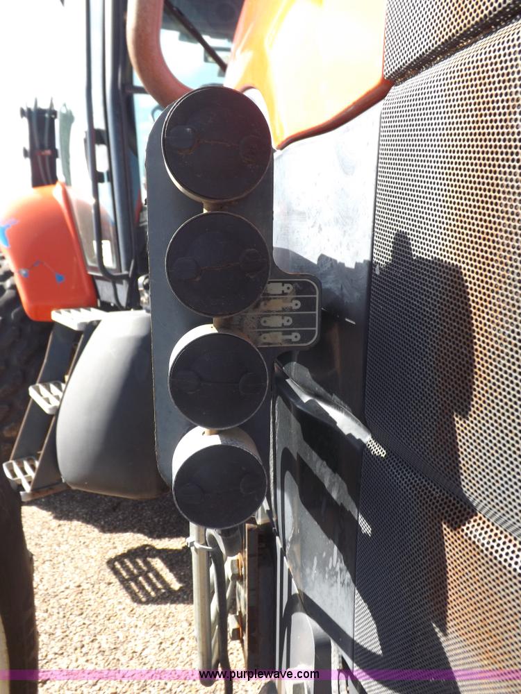 image for item I7528 1999 New Holland TV-140 MFWD bi-directional tractor