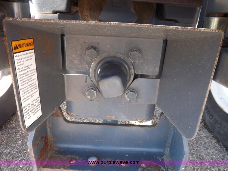 image for item I7528 1999 New Holland TV-140 MFWD bi-directional tractor