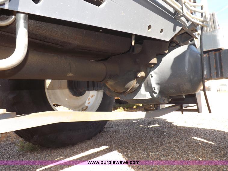 image for item I7528 1999 New Holland TV-140 MFWD bi-directional tractor