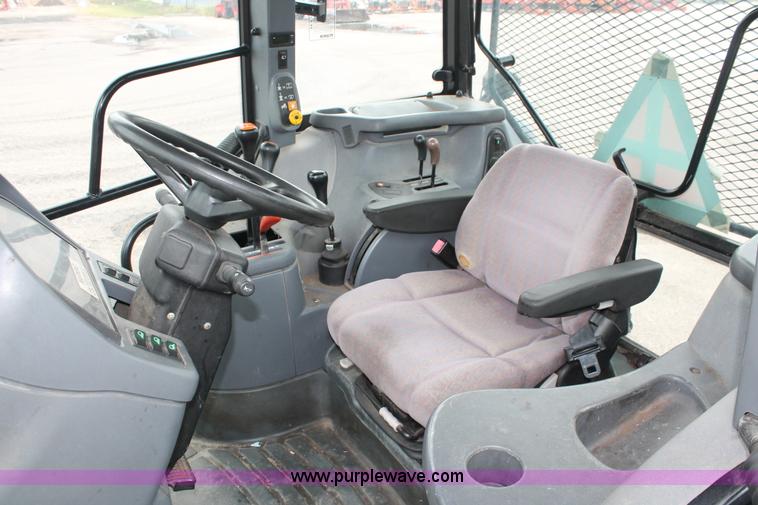 image for item I8025 1999 Ford New Holland TS100 tractor