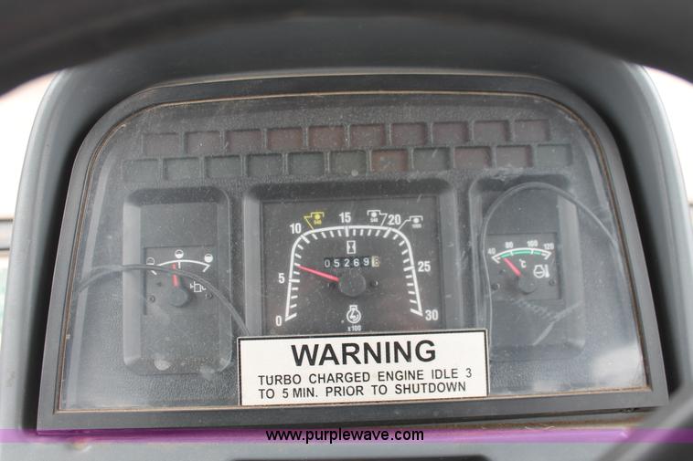 image for item I8025 1999 Ford New Holland TS100 tractor