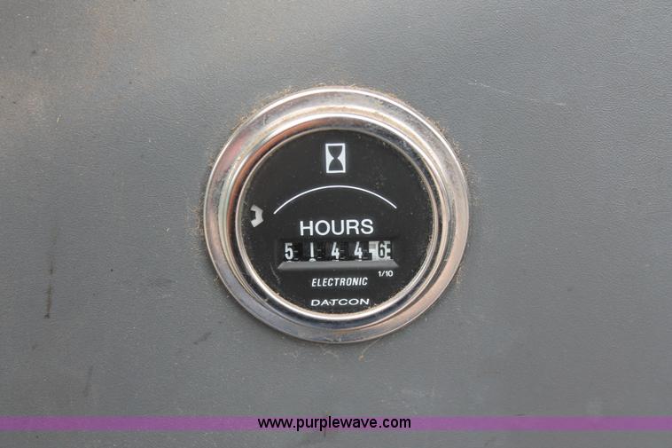 image for item I8025 1999 Ford New Holland TS100 tractor